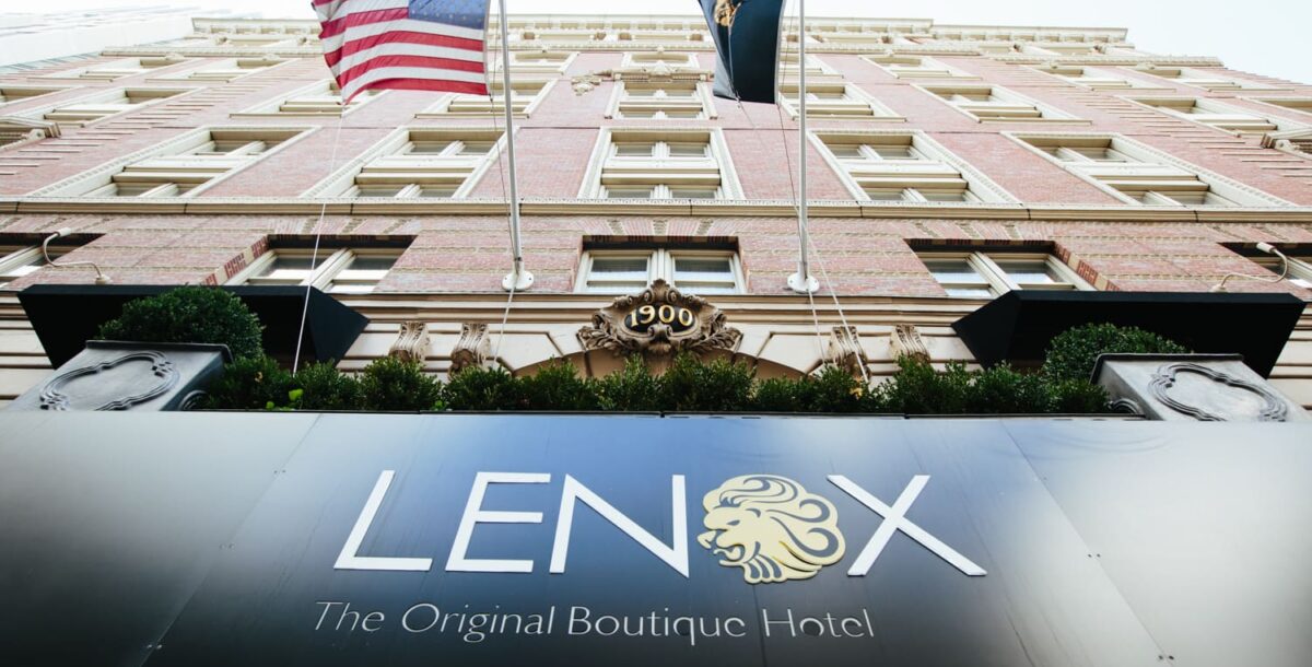 Lenox hotel exterior at an angle with flags and hotel sign