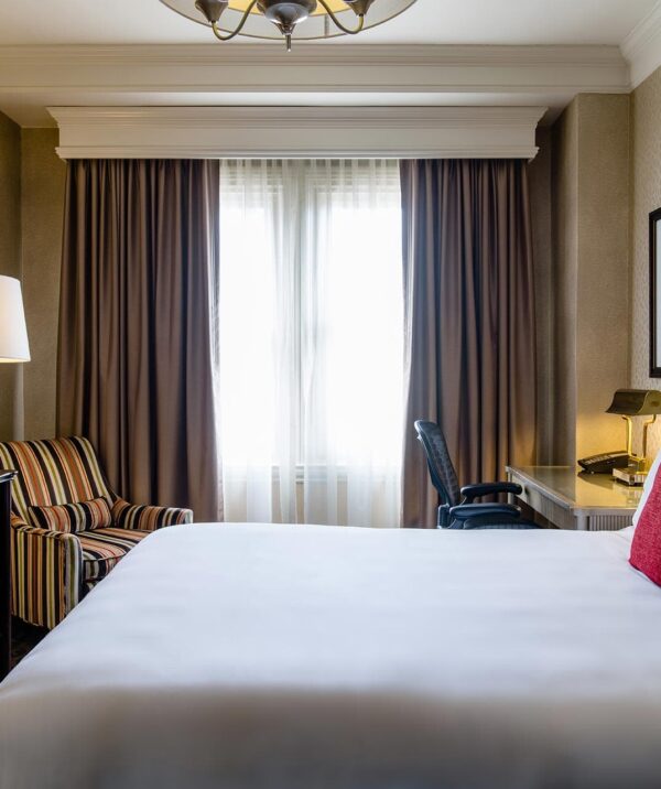 Classic Guestroom at Lenox Hotel with bed and bureau