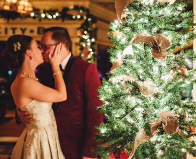 Bride and Groom in lobby with Christmas decorations