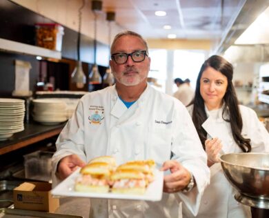 Lenox employees prepare food in kitchen during housekeeping week