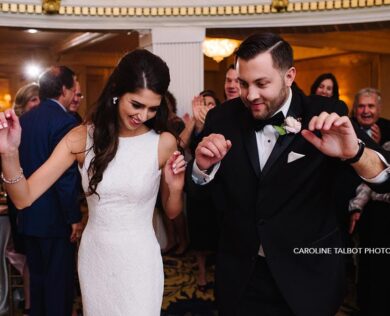 Bride and groom dance at wedding reception